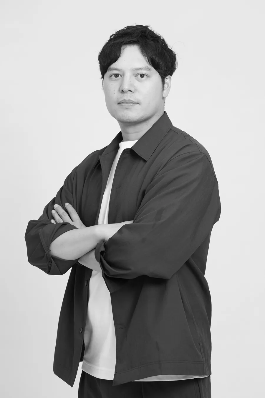 溝橋 正輝、腕組み